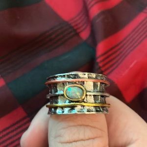 Handmade ring with opal stone in the middle